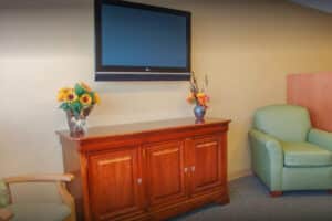 Prairie Heights care station with a large wooden desk and workspace